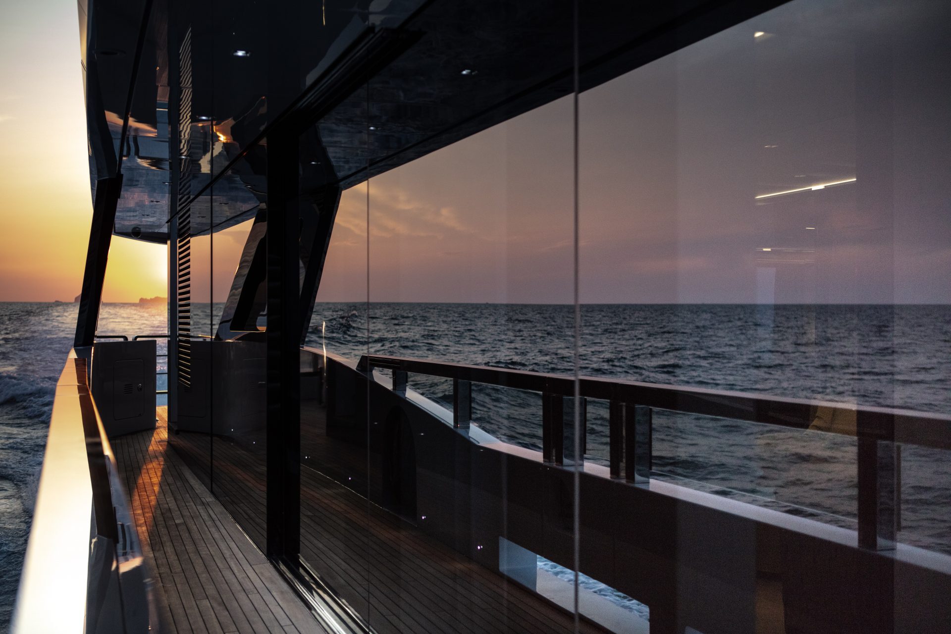 Mangusta yacht deck at sunset, ocean view