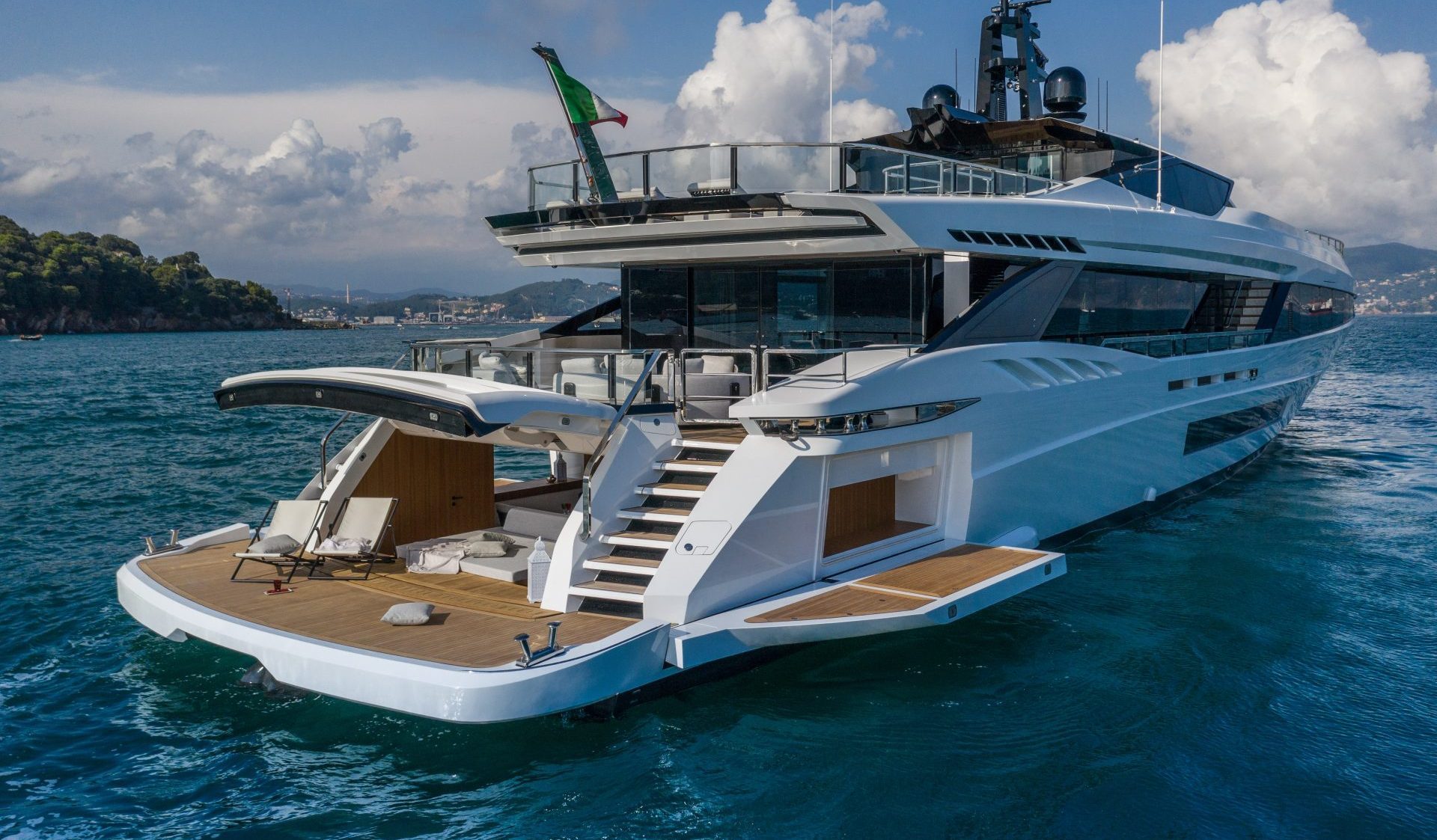 Luxury Mangusta yacht in open sea.