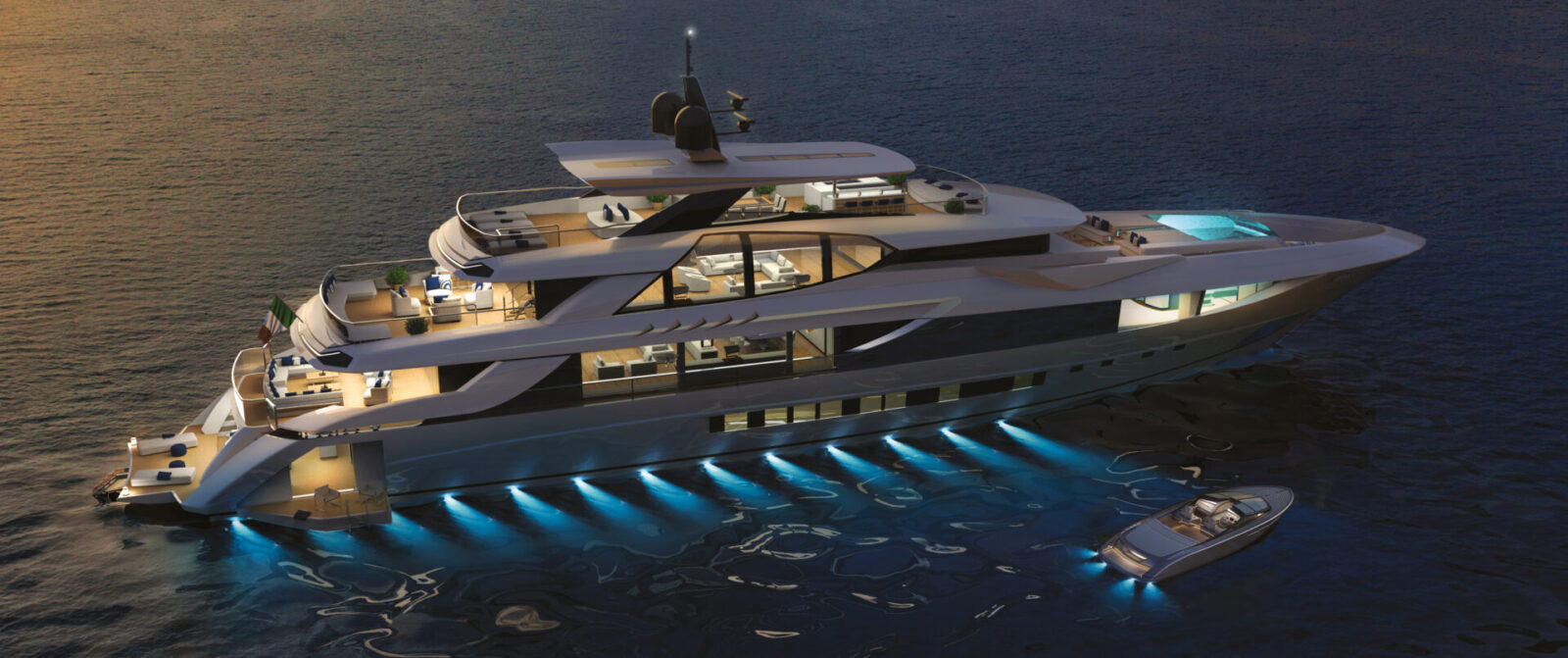 Mangusta Yachts in navigazione notturna illuminata