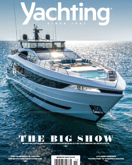 Mangusta yacht cruising on a sunny ocean day