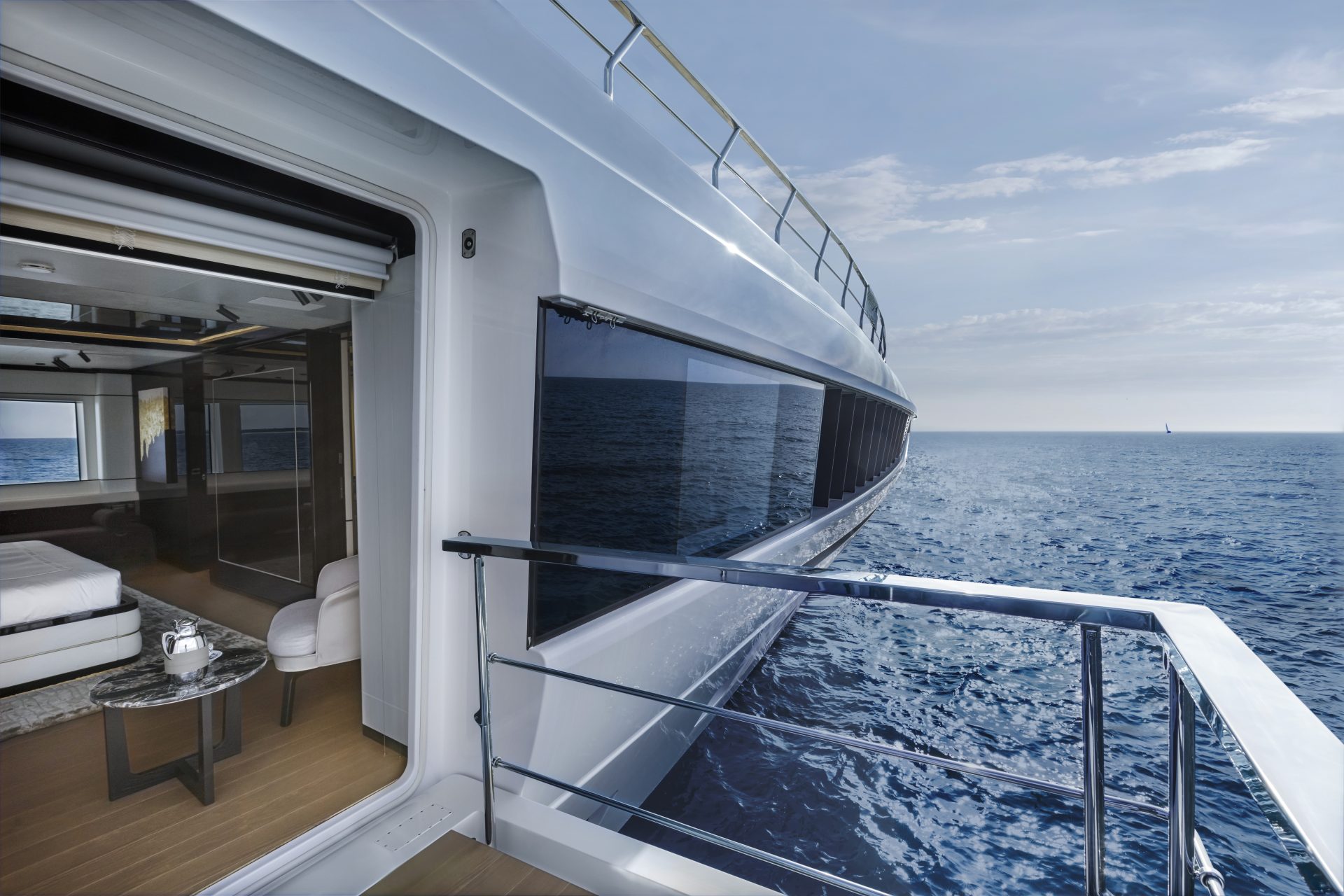 Luxurious Mangusta yacht cruising on open sea.