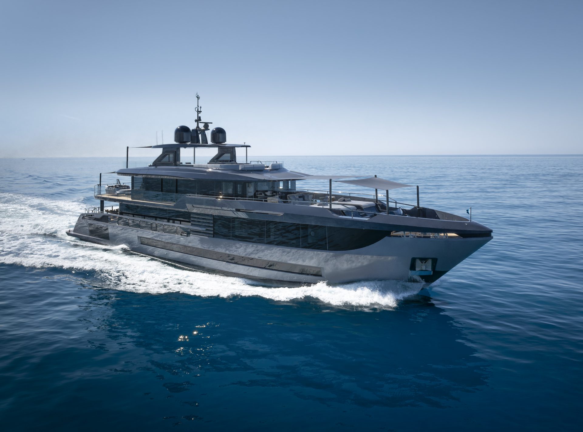 Mangusta yacht cruising on open sea.