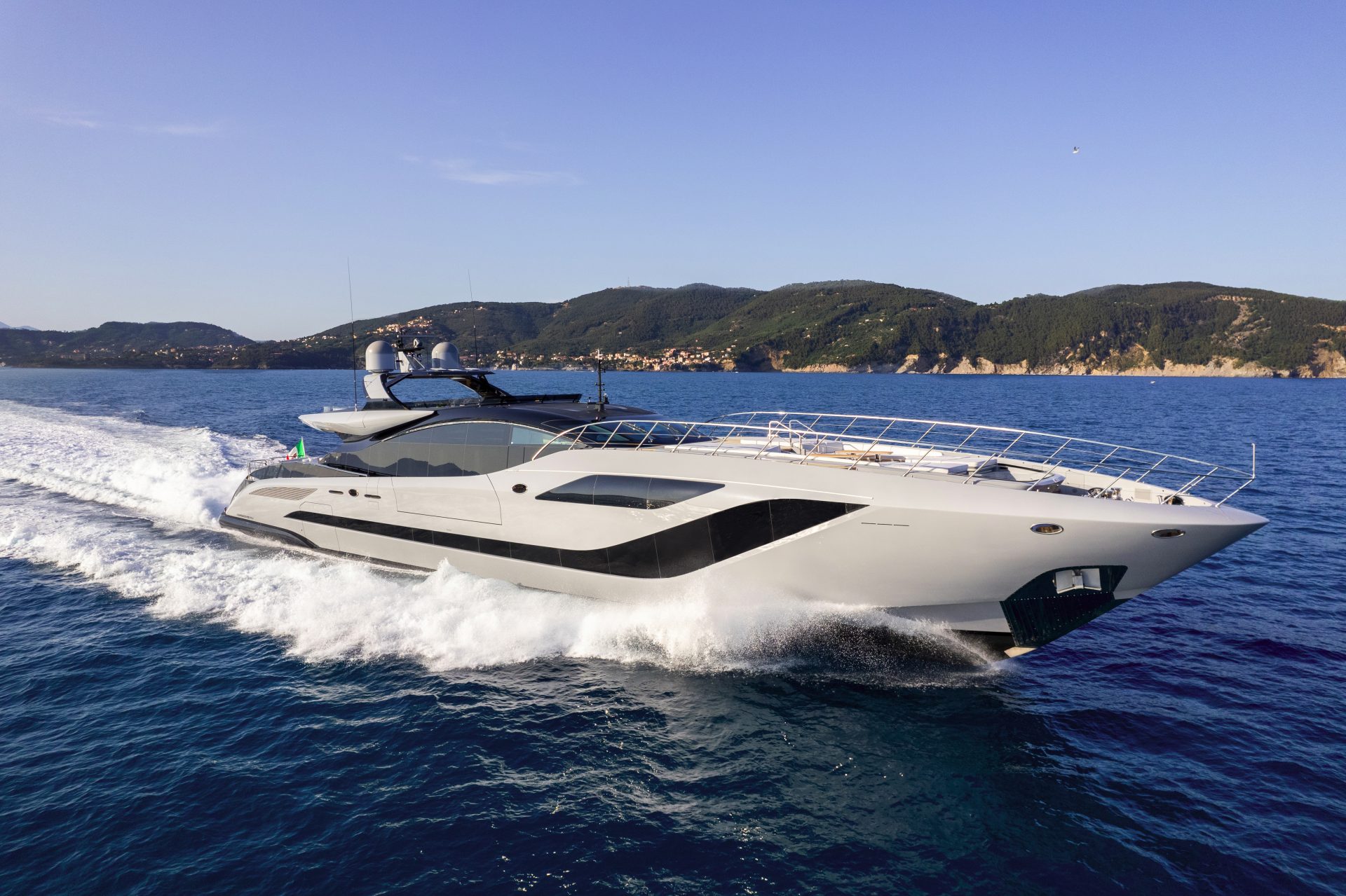 Luxurious Mangusta yacht cruising at sea