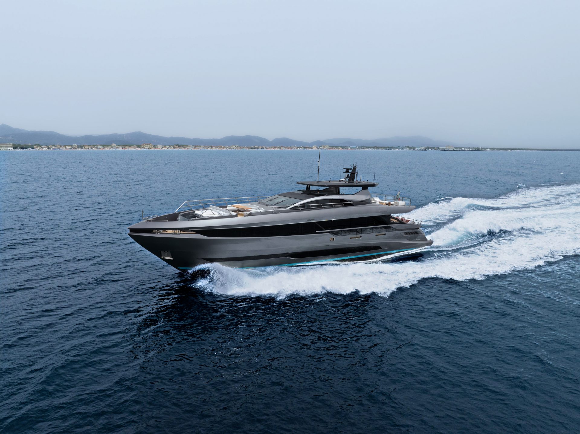 Mangusta yacht cruising on open sea.