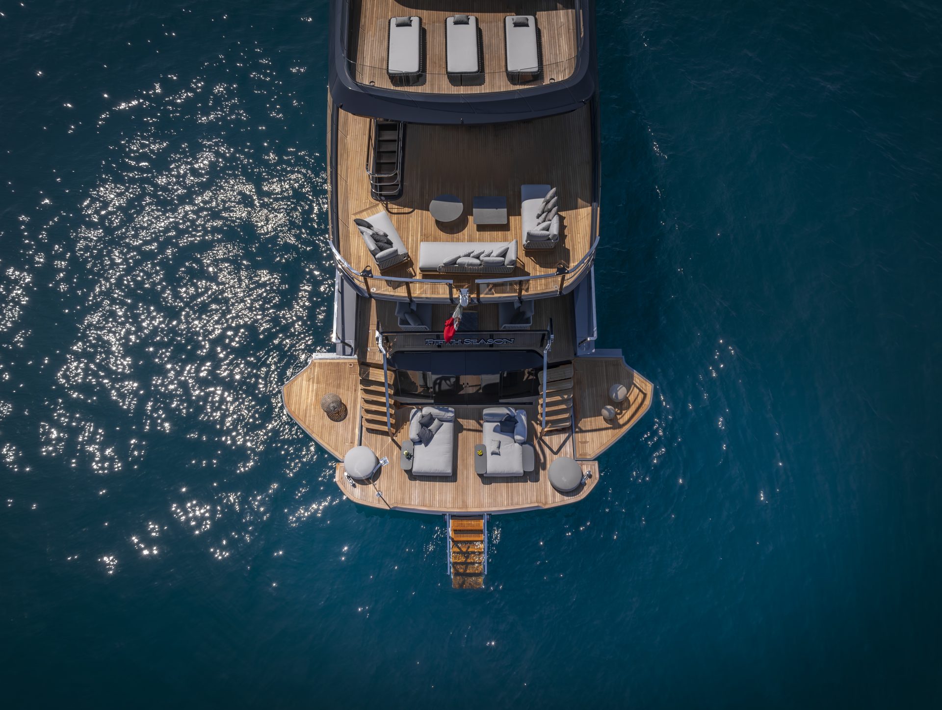 Luxury Mangusta Yacht deck on sparkling water