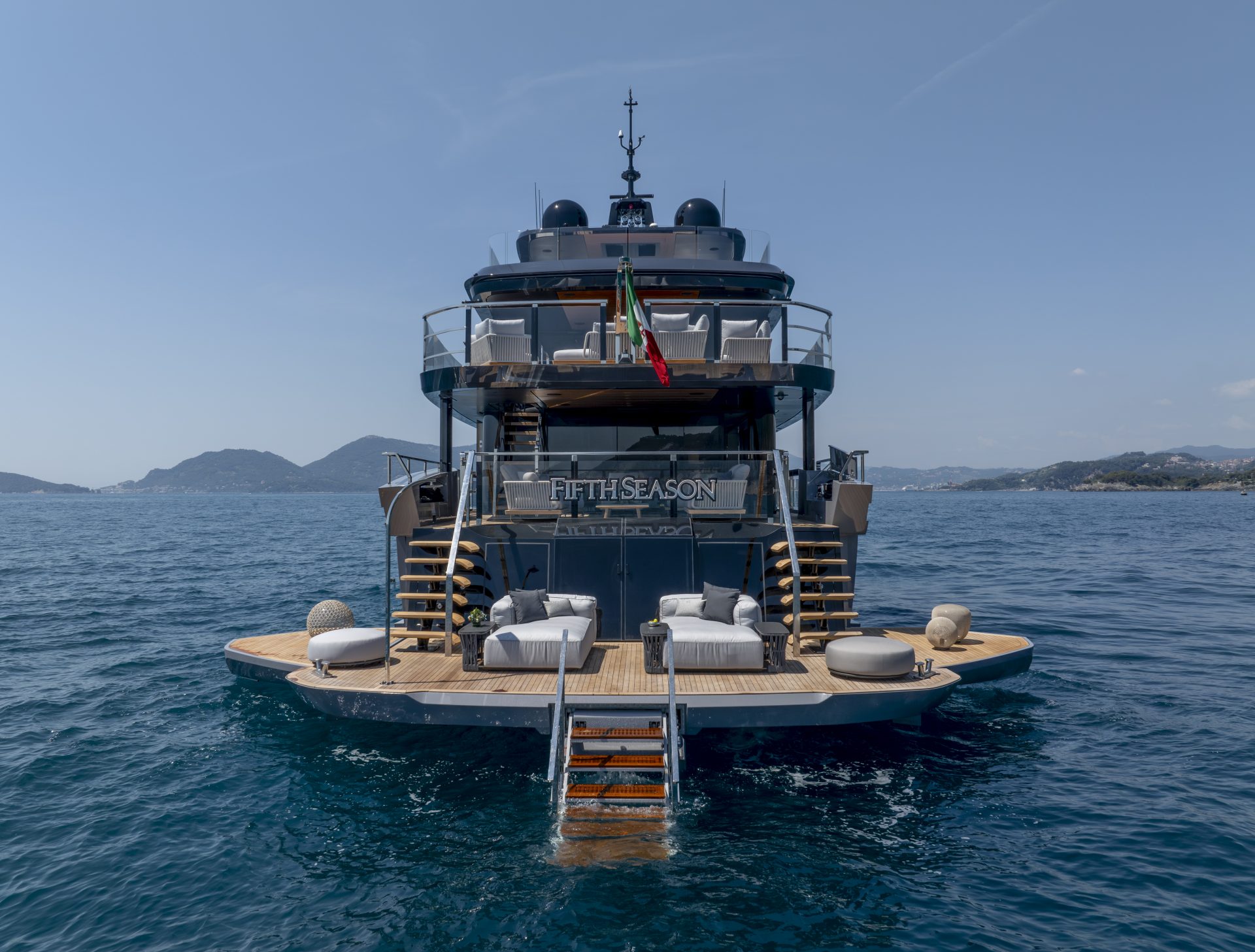 Luxury Mangusta yacht with elegant rear deckview