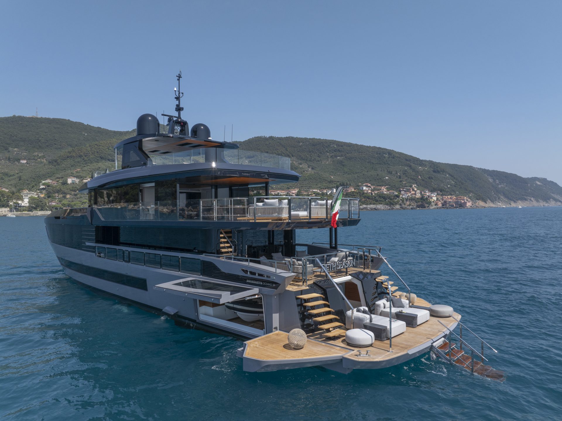 Mangusta yacht cruising near Italian coast