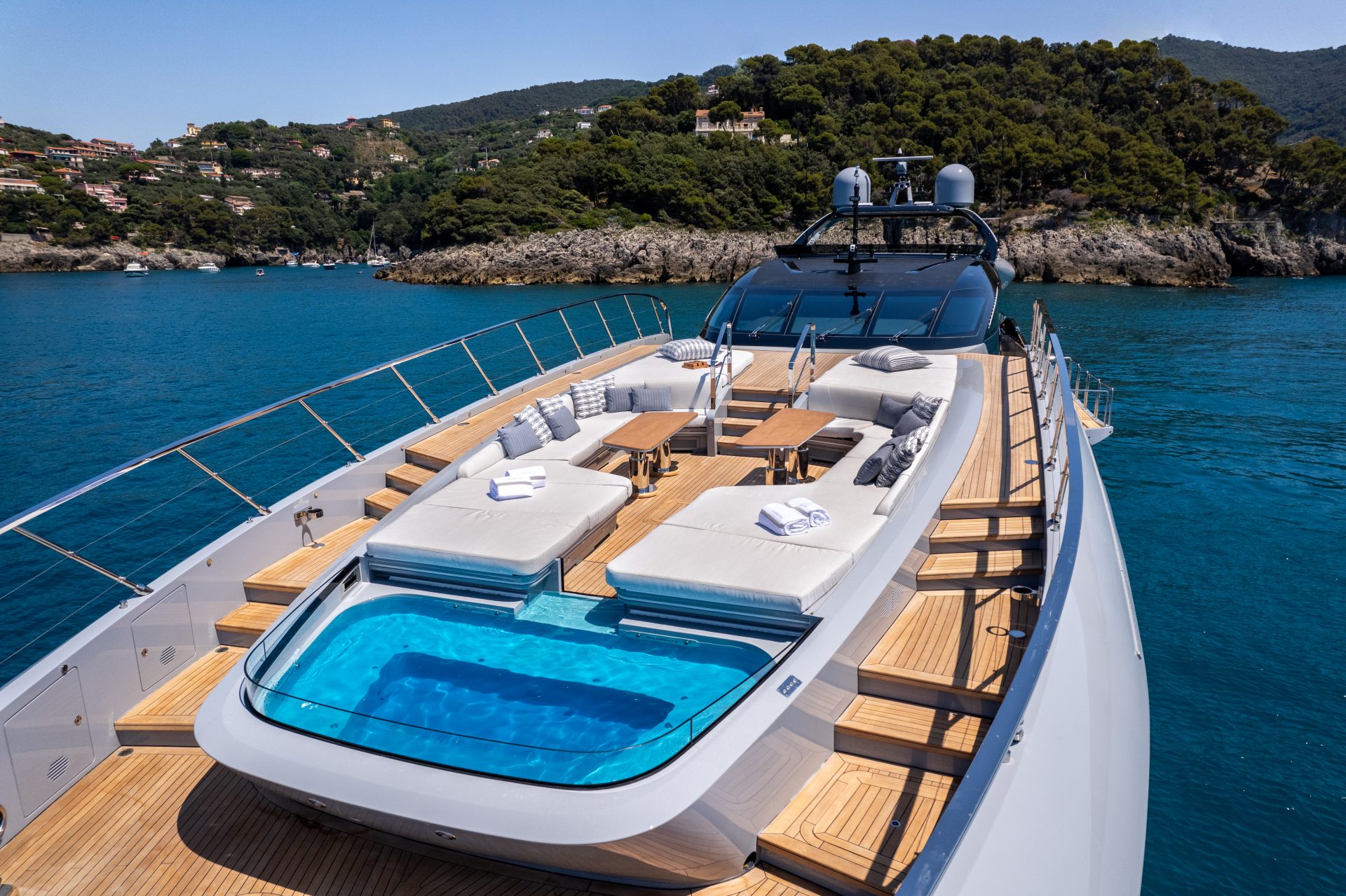 Luxurious Mangusta yacht deck with spa pool.