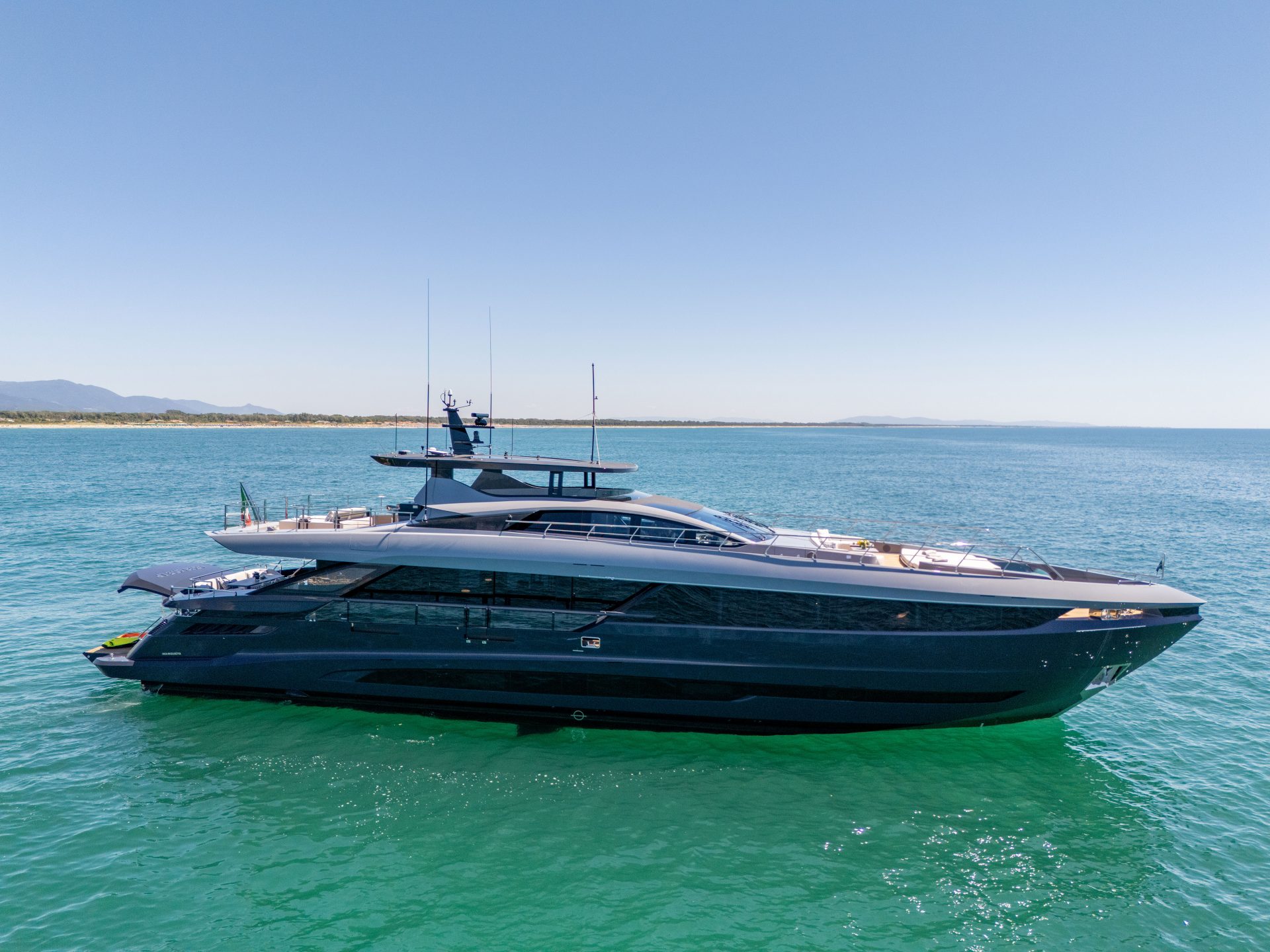 Luxurious Mangusta Yacht cruising on the sea