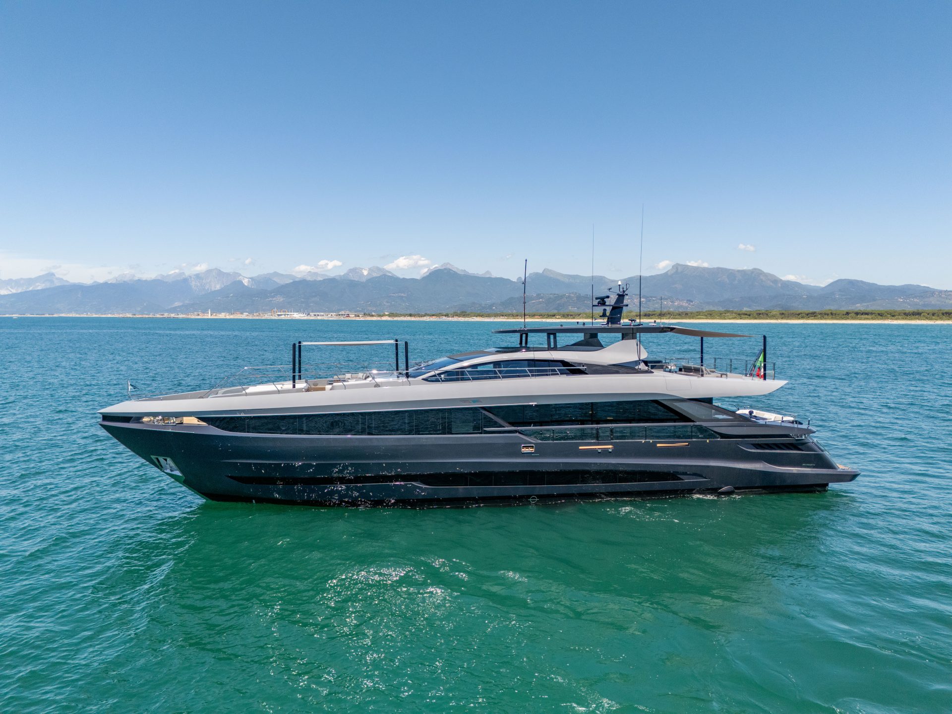 Mangusta yacht cruising on open sea