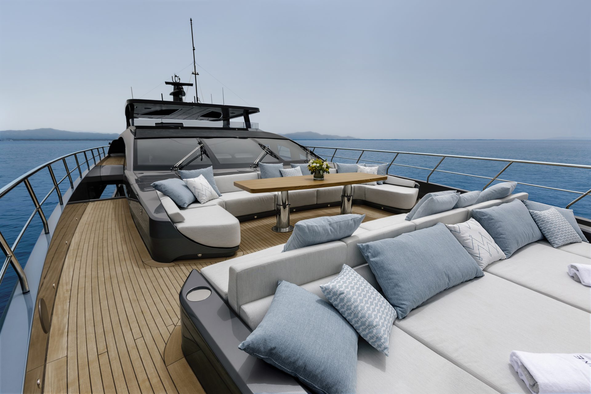 Luxurious deck lounge on Mangusta yacht sailing