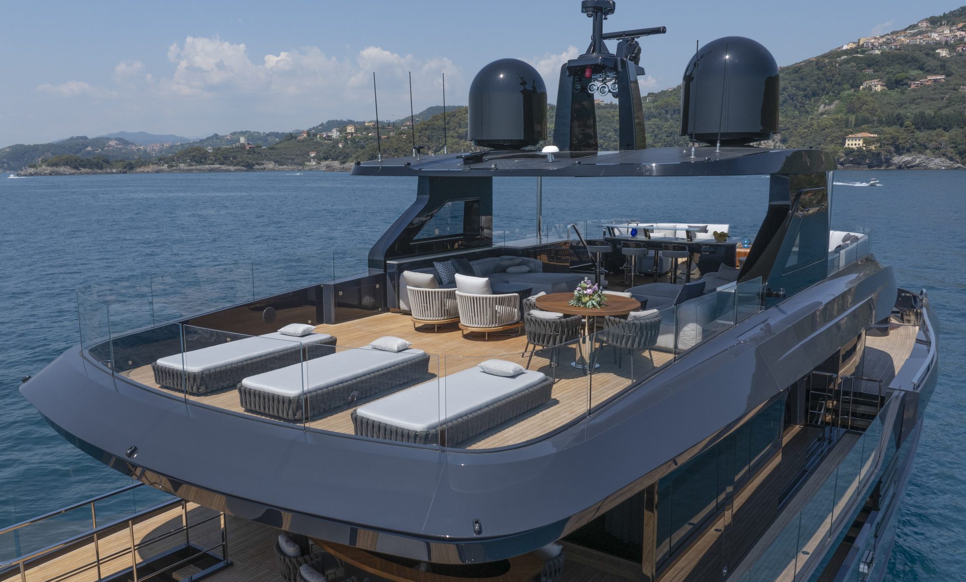 Mangusta yacht deck with loungers and seating area