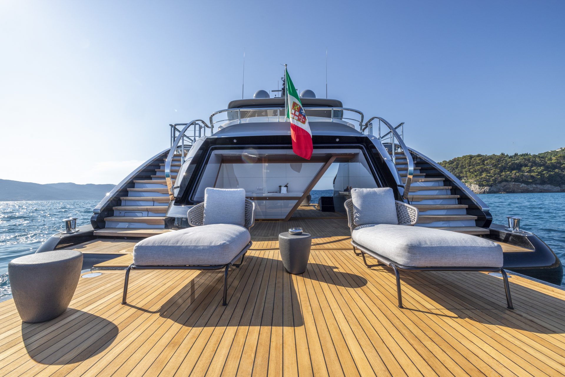 Sun deck of Mangusta Yacht with lounge chairs