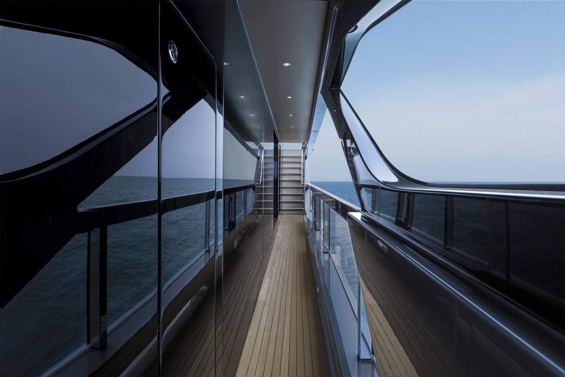 Luxurious Mangusta yacht deck with ocean view.