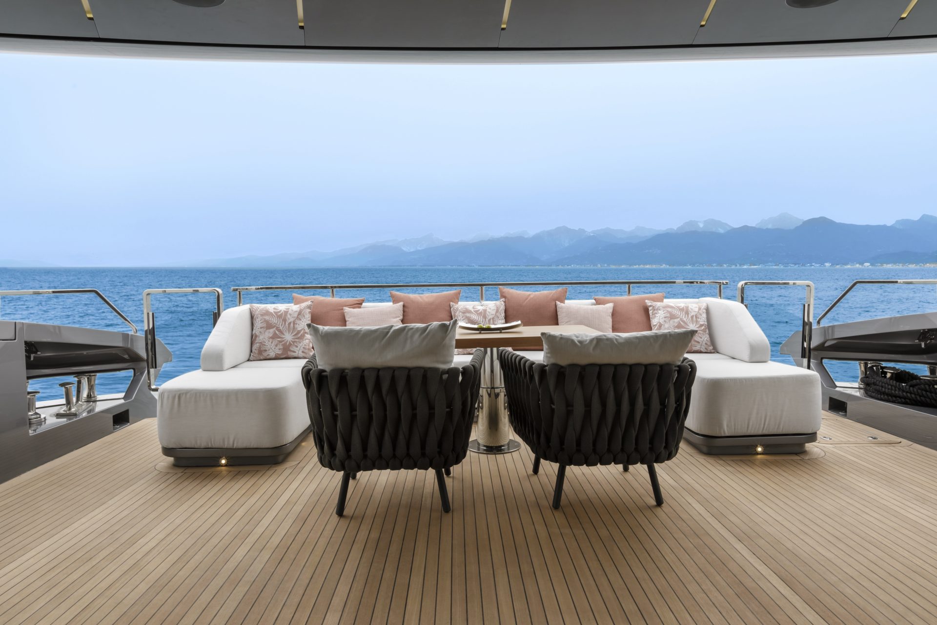 Luxurious yacht deck with seating and ocean view
