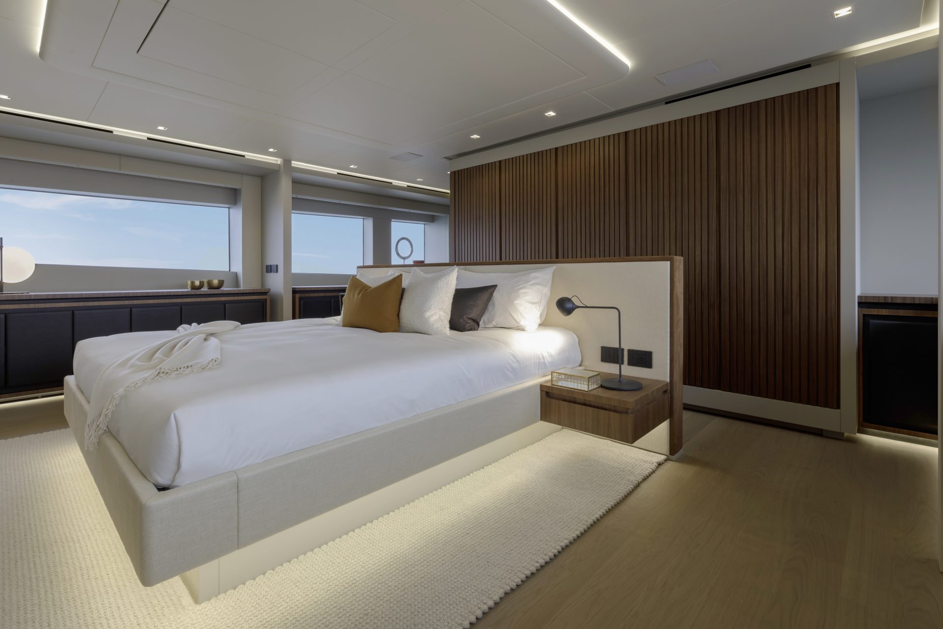 Luxurious bedroom interior on Mangusta Yacht.
