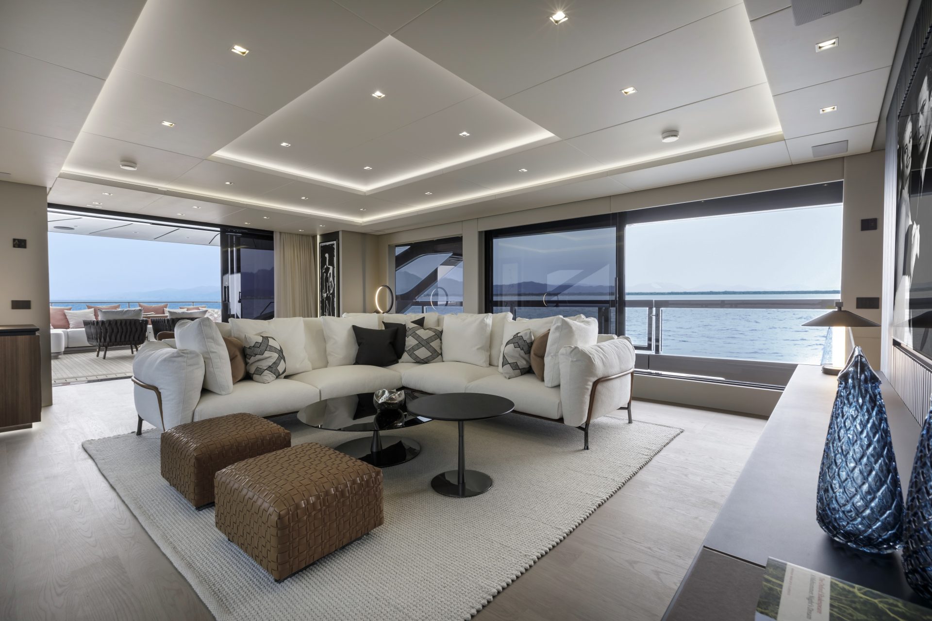 Luxurious Mangusta yacht interior lounge area.