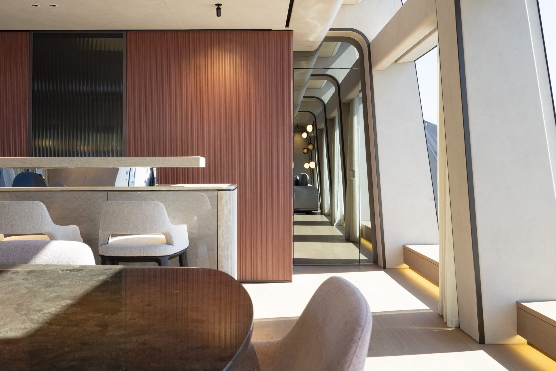 Elegant yacht interior with modern seating area.