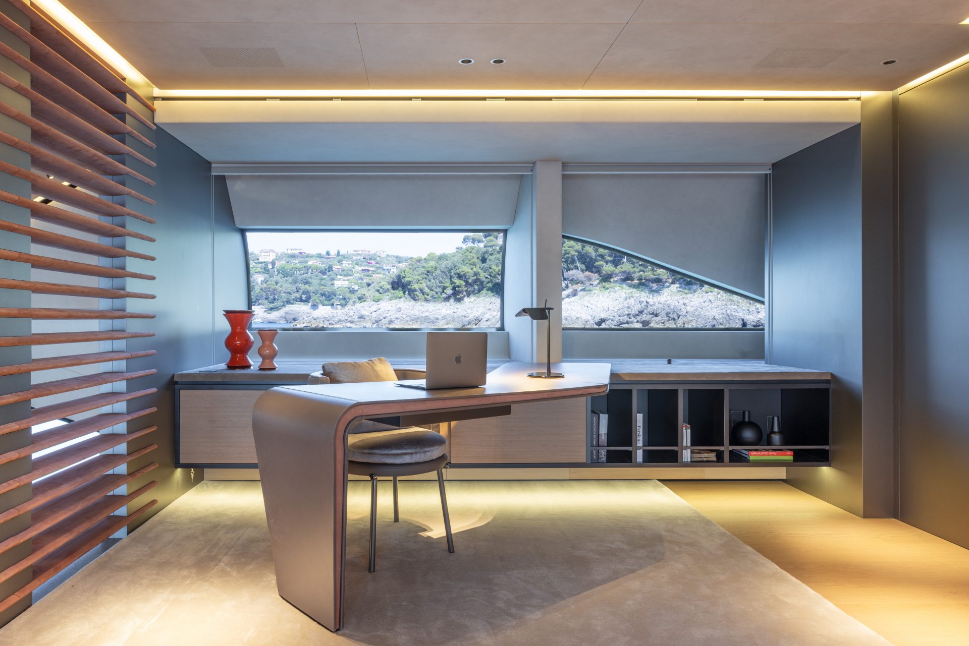 Luxurious yacht interior with ocean view desk