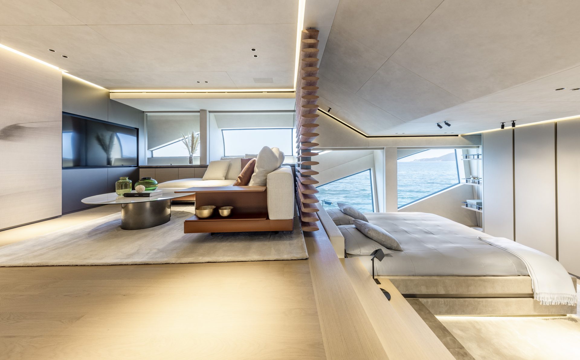 Luxury yacht interior with ocean view and modern decor.