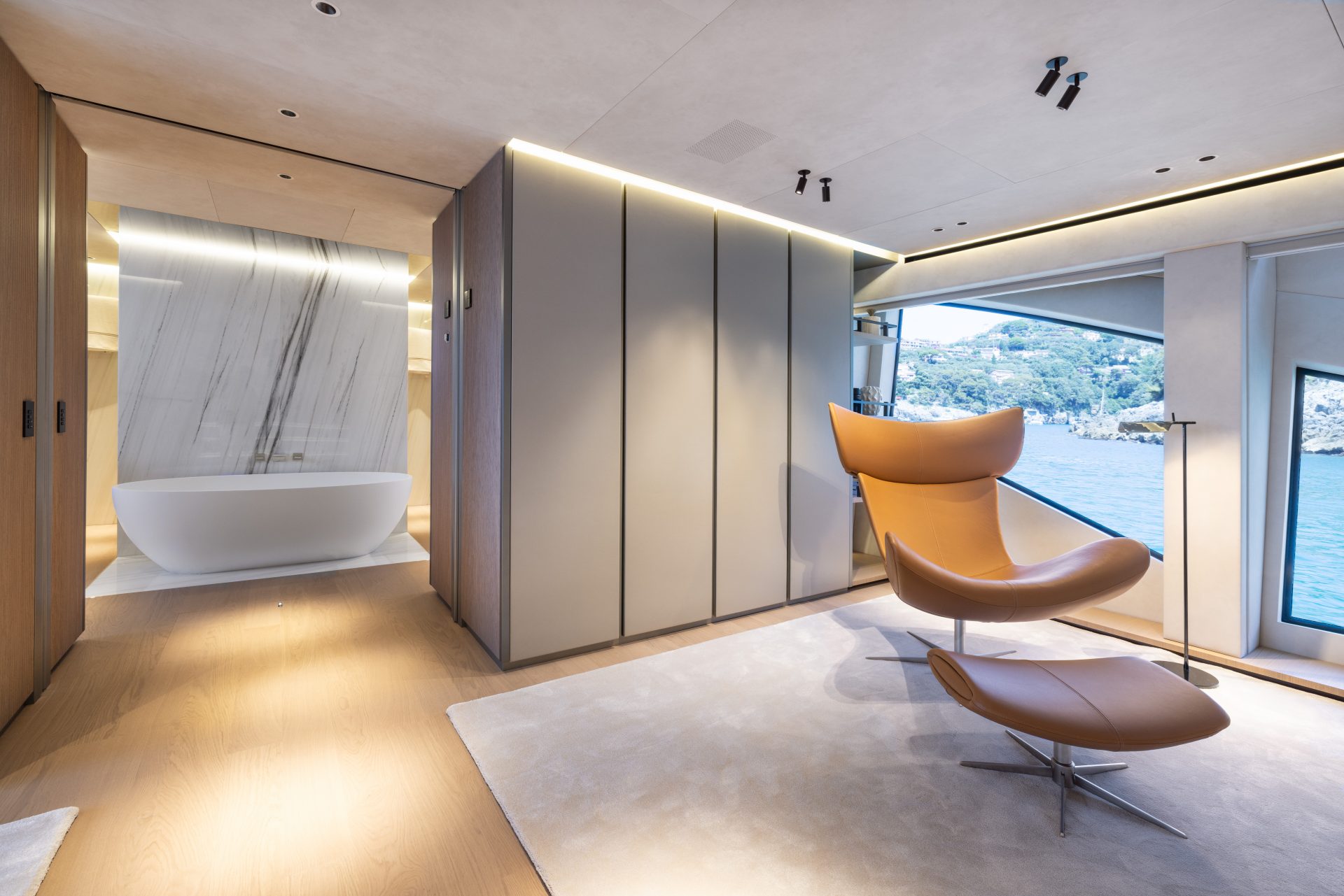 Luxurious yacht interior with modern bathtub.