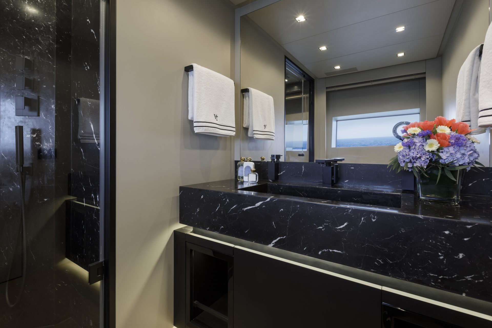 Luxurious yacht bathroom with ocean view.