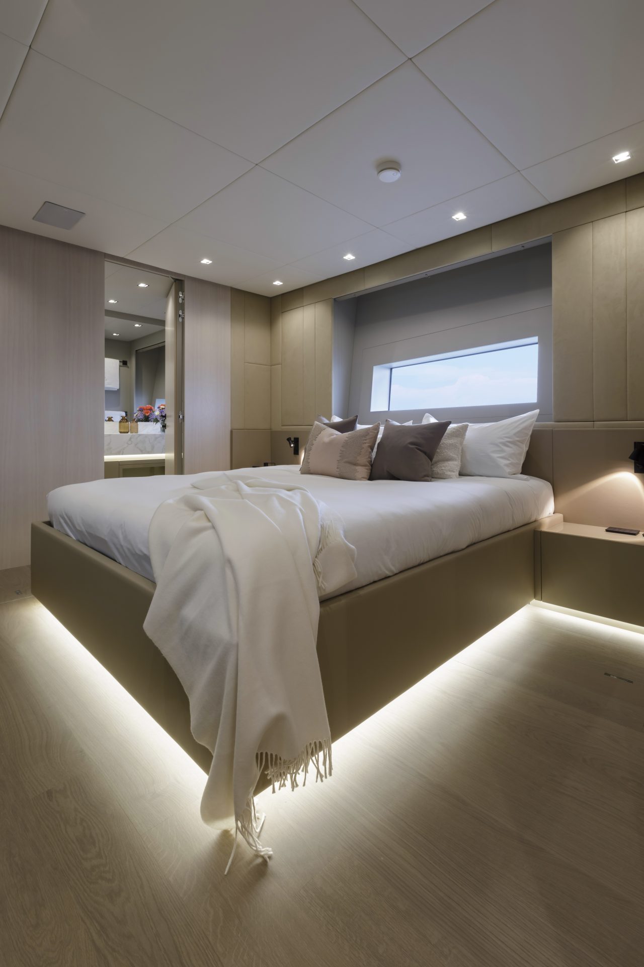 Luxury yacht bedroom with soft lighting