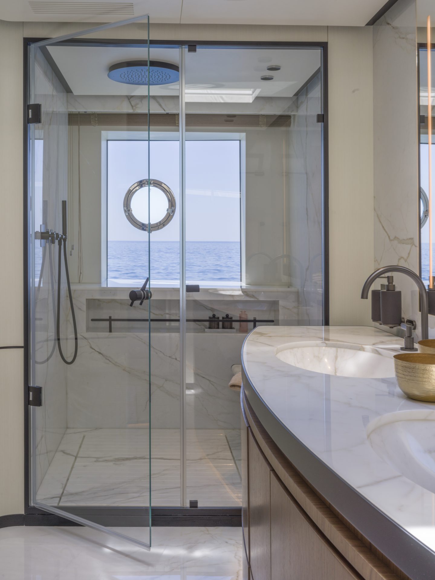 Luxury yacht bathroom with sleek marble design.