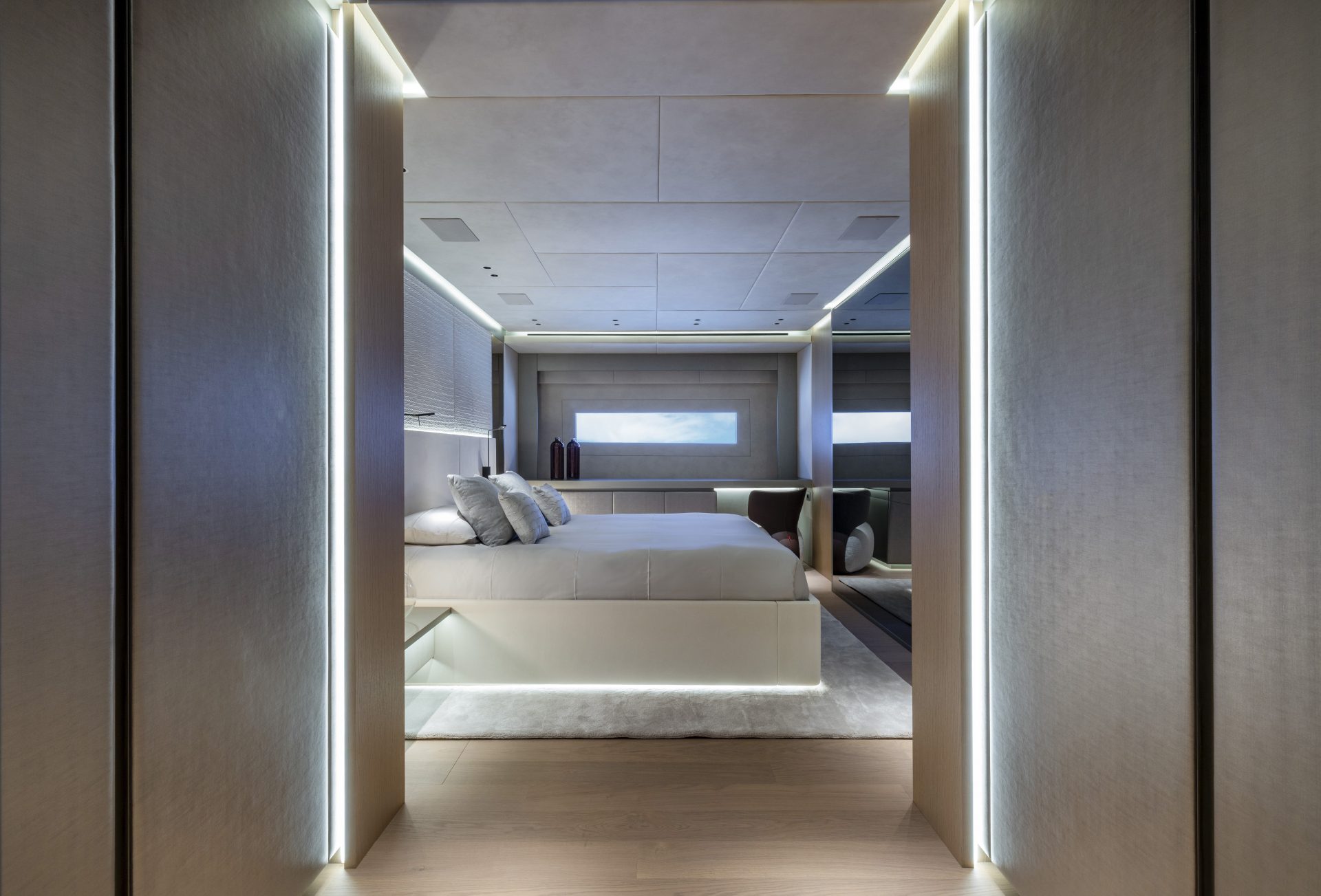 Luxurious yacht bedroom with modern design.