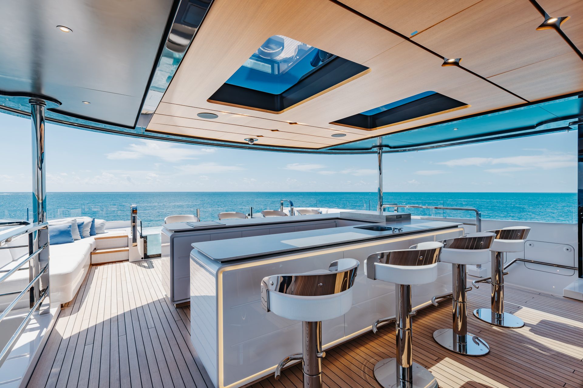 Luxury yacht deck with bar and ocean view