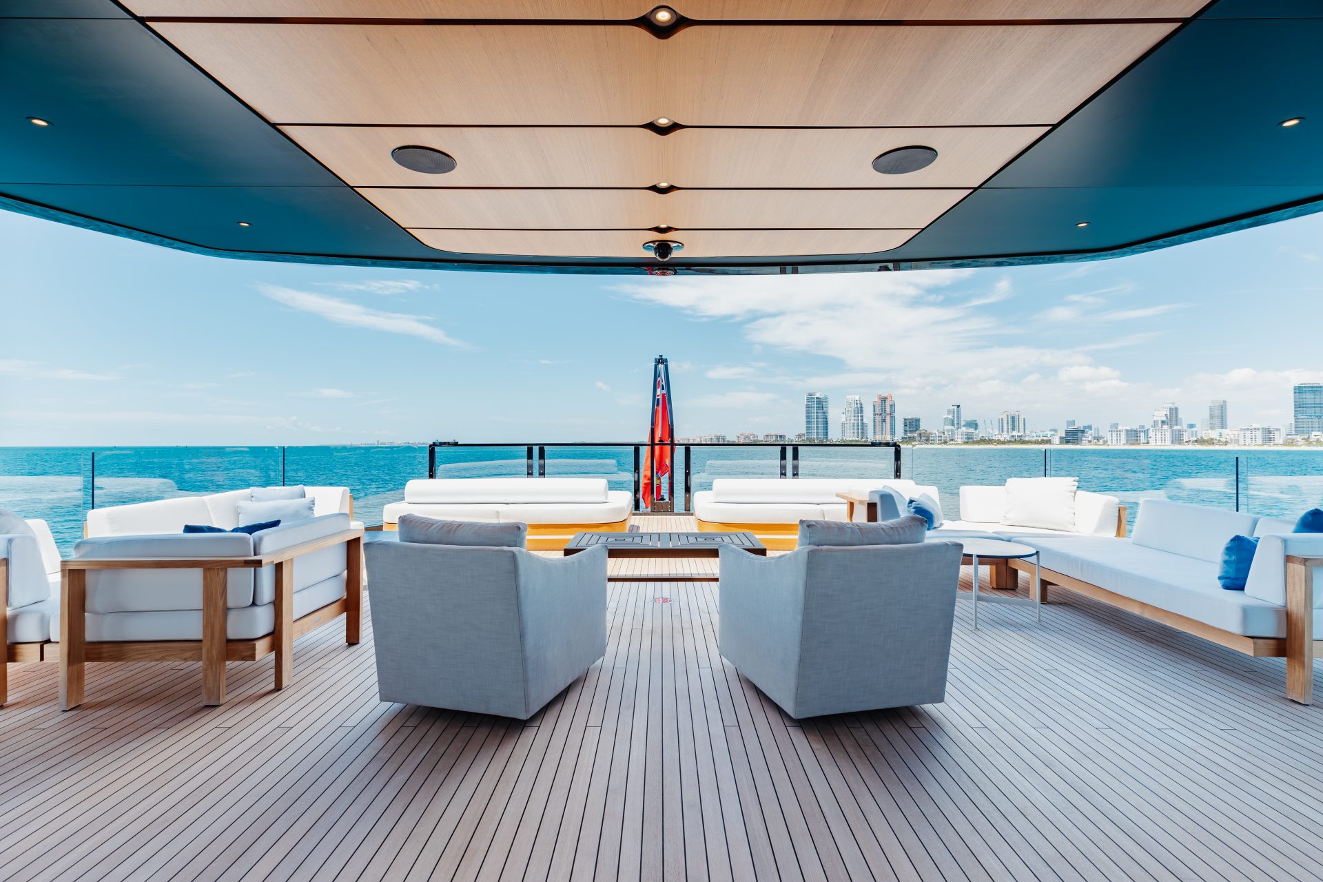 Mangusta yacht deck with ocean and skyline view