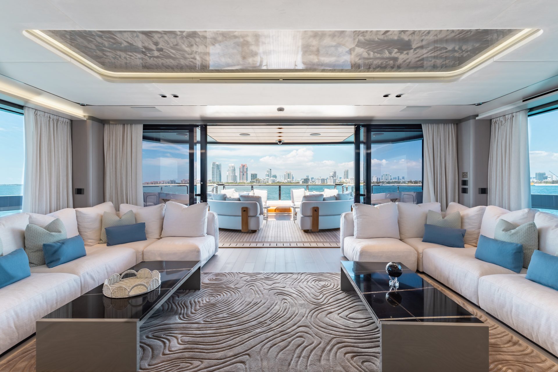 Luxurious yacht lounge with city skyline view