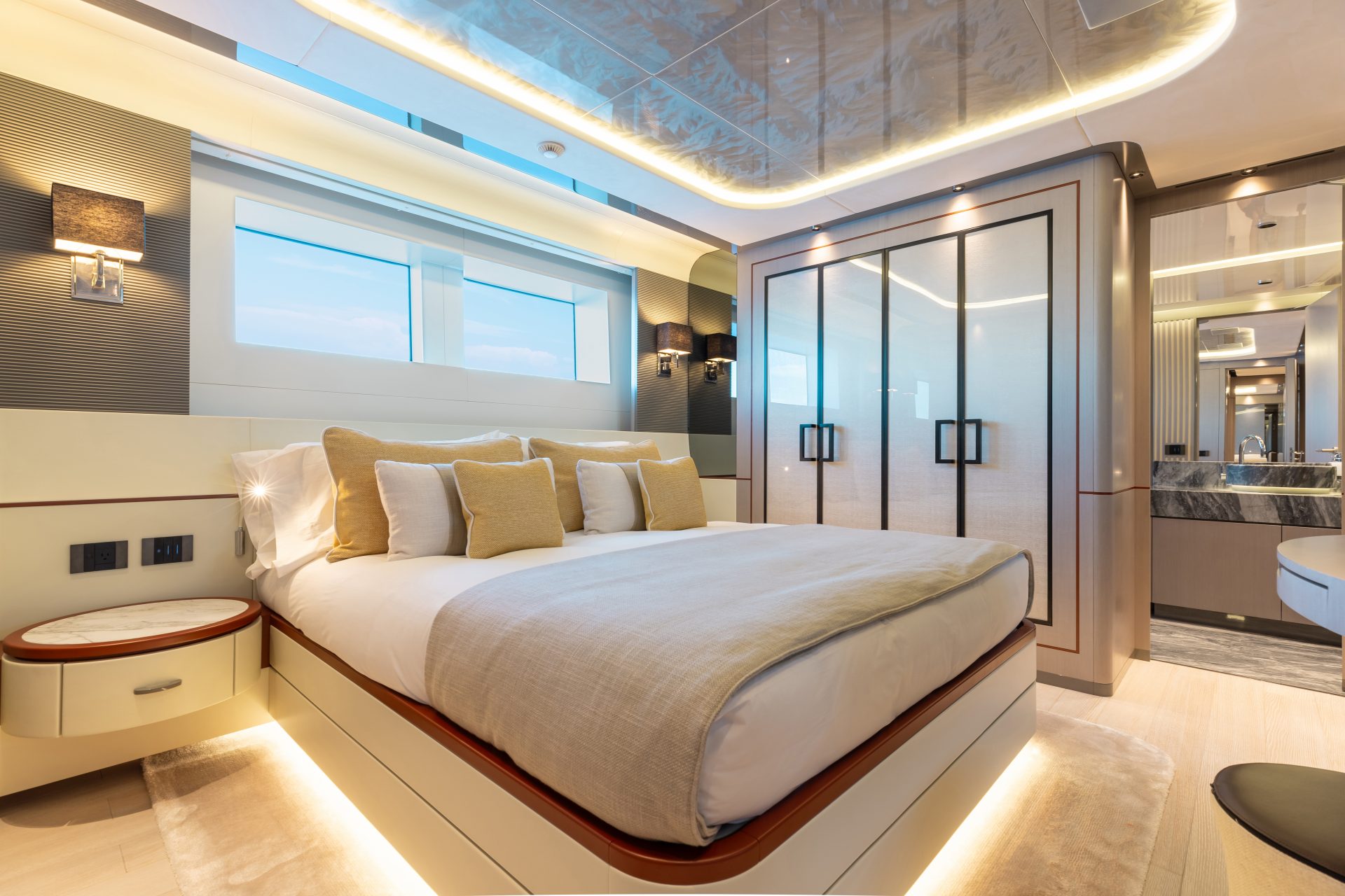 Luxurious bedroom interior on Mangusta Yacht