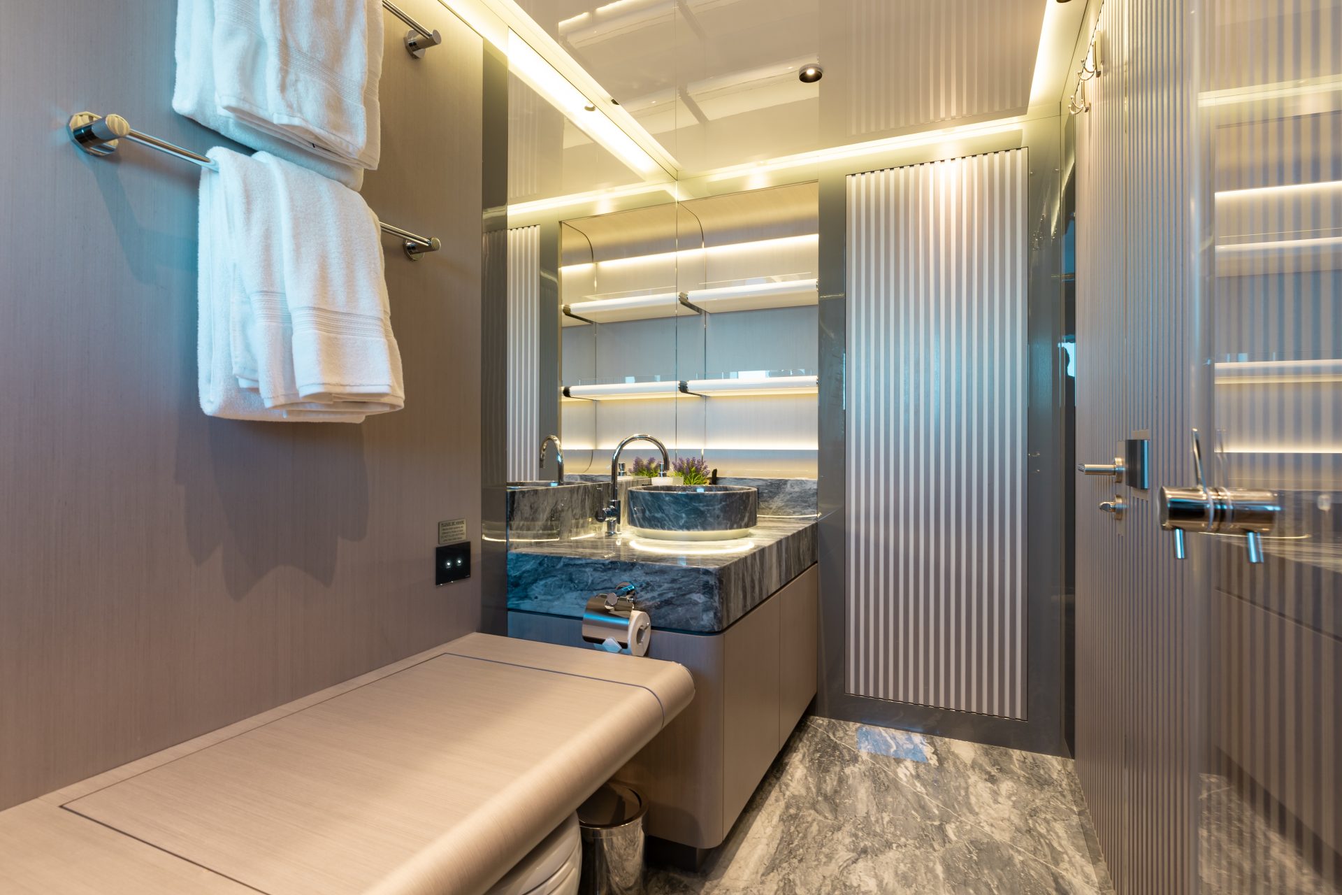 Luxurious bathroom interior on Mangusta yacht